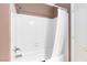 Bathroom with shower and tub combination, tiled walls and shower curtain at 2219 Rugged Mesa Dr, Laughlin, NV 89029