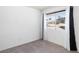 Sunny bedroom with carpeting and an expansive exterior view at 2219 Rugged Mesa Dr, Laughlin, NV 89029