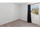 Sunlit bedroom offers a serene view and plush carpeting at 2219 Rugged Mesa Dr, Laughlin, NV 89029