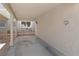 Covered carport featuring decorative columns and a cozy outdoor seating area at 2219 Rugged Mesa Dr, Laughlin, NV 89029