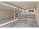 Carport providing covered parking and a glimpse of the patio at 2219 Rugged Mesa Dr, Laughlin, NV 89029