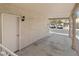 Spacious covered carport area with textured wall finish and durable concrete flooring at 2219 Rugged Mesa Dr, Laughlin, NV 89029