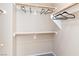 A functional closet with shelving units and hanging racks to keep belongings organized at 2219 Rugged Mesa Dr, Laughlin, NV 89029