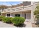 Charming two-story home with a secure front entrance and neatly trimmed shrubs at 2219 Rugged Mesa Dr, Laughlin, NV 89029