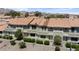 Community townhomes showcasing multiple windows and outdoor balcony at 2219 Rugged Mesa Dr, Laughlin, NV 89029