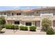 Inviting townhome showcasing multiple windows and outdoor balcony at 2219 Rugged Mesa Dr, Laughlin, NV 89029