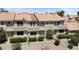 Attractive townhome showcasing multiple windows and outdoor balcony at 2219 Rugged Mesa Dr, Laughlin, NV 89029