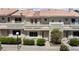 Attractive townhome showcases multiple windows and outdoor balcony at 2219 Rugged Mesa Dr, Laughlin, NV 89029