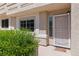 Inviting front entrance with decorative accents and lush green landscaping at 2219 Rugged Mesa Dr, Laughlin, NV 89029