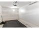 Simple garage interior featuring an automatic door opener and concrete floor at 2219 Rugged Mesa Dr, Laughlin, NV 89029