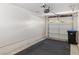 Neat garage space with an automatic door opener and space for parking and storage at 2219 Rugged Mesa Dr, Laughlin, NV 89029