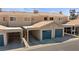 Attached garages with blue doors offer convenient parking for community residents at 2219 Rugged Mesa Dr, Laughlin, NV 89029