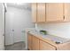 Upper hallway cabinets provide extra storage and decor space at 2219 Rugged Mesa Dr, Laughlin, NV 89029