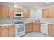 Functional kitchen featuring a gas range and ample cabinet space at 2219 Rugged Mesa Dr, Laughlin, NV 89029