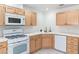 Functional kitchen featuring a gas range and ample cabinet space at 2219 Rugged Mesa Dr, Laughlin, NV 89029