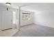 Bright living room with natural light, neutral colors, and tiled entryway at 2219 Rugged Mesa Dr, Laughlin, NV 89029