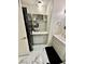 Laundry area with modern washer/dryer and white marble floors at 2232 Aspen Mirror Dr # 203, Laughlin, NV 89029