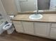 Bathroom with a white vanity, granite countertop, and combined tub and shower at 2900 Sunridge Heights Pkwy # 816, Henderson, NV 89052