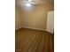 Bedroom featuring wood-look floors, overhead fan and light, and neutral walls at 2900 Sunridge Heights Pkwy # 816, Henderson, NV 89052