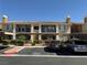 Exterior view of building 8 featuring balconies and covered parking at 2900 Sunridge Heights Pkwy # 816, Henderson, NV 89052