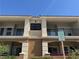 Exterior view of building 8 featuring balconies and covered parking spots at 2900 Sunridge Heights Pkwy # 816, Henderson, NV 89052