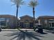 Exterior view of the Avalon community clubhouse with covered entryway, desert landscaping and golf cart at 2900 Sunridge Heights Pkwy # 816, Henderson, NV 89052
