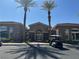 Exterior view of the Avalon community clubhouse with covered entryway, desert landscaping and golf cart at 2900 Sunridge Heights Pkwy # 816, Henderson, NV 89052