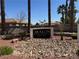 Close up of the Avalon at Seven Hills community sign with stone landscaping and palm trees at 2900 Sunridge Heights Pkwy # 816, Henderson, NV 89052