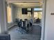 Conference room with tile flooring, meeting table, office chairs and large window at 2900 Sunridge Heights Pkwy # 816, Henderson, NV 89052