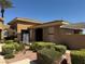 Attractive exterior showcasing beautiful desert landscaping, exterior architecture, and inviting entryway at 2900 Sunridge Heights Pkwy # 816, Henderson, NV 89052
