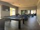 Game room with a pool table, TV, comfortable seating and plenty of space to relax at 2900 Sunridge Heights Pkwy # 816, Henderson, NV 89052