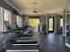 Community gym featuring modern treadmills, stationary bikes, and mounted TV, plus exit at 2900 Sunridge Heights Pkwy # 816, Henderson, NV 89052