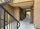 Inviting hallway with warm lighting leading to stairwell access, perfect for convenient community living at 2900 Sunridge Heights Pkwy # 816, Henderson, NV 89052