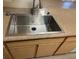 Kitchen sink features a modern faucet and granite countertop at 2900 Sunridge Heights Pkwy # 816, Henderson, NV 89052