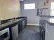 Amenity kitchenette with stainless steel appliances, granite countertops, and tile backsplash at 2900 Sunridge Heights Pkwy # 816, Henderson, NV 89052