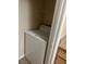 A white dryer in a closet with a shelf above at 2900 Sunridge Heights Pkwy # 816, Henderson, NV 89052