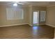 The living room has two windows and a door to a patio or balcony at 2900 Sunridge Heights Pkwy # 816, Henderson, NV 89052