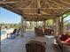 Extended outdoor patio with shaded area, ceiling fans, and seating surrounding the pool at 2900 Sunridge Heights Pkwy # 816, Henderson, NV 89052