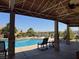 Scenic pool view featuring lounge chairs and shaded patio areas, perfect for relaxation and outdoor enjoyment at 2900 Sunridge Heights Pkwy # 816, Henderson, NV 89052