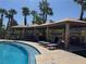 Resort-style pool with shaded cabanas, lounge chairs, and outdoor grilling area for ultimate relaxation and entertaining at 2900 Sunridge Heights Pkwy # 816, Henderson, NV 89052