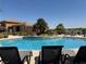 Community pool featuring a beautiful waterfall feature and plenty of lounge chairs at 2900 Sunridge Heights Pkwy # 816, Henderson, NV 89052