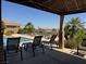 Community pool has a shallow end with chairs, sunning deck, and landscaping at 2900 Sunridge Heights Pkwy # 816, Henderson, NV 89052