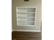 A set of built in shelves with laminate flooring at 2900 Sunridge Heights Pkwy # 816, Henderson, NV 89052