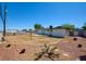 Expansive backyard with potential for lush landscaping and outdoor enjoyment under the open sky at 304 Elliott Ave, Las Vegas, NV 89106