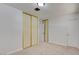 Bright bedroom features a spacious closet, neutral carpet, and fresh paint, offering a cozy retreat at 304 Elliott Ave, Las Vegas, NV 89106