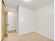 This bedroom features neutral carpet, white walls, and closet at 304 Elliott Ave, Las Vegas, NV 89106
