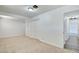 This bedroom features neutral carpet, white walls, and dual sliding-door closet at 304 Elliott Ave, Las Vegas, NV 89106