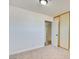 This bedroom features neutral carpet, white walls, and closet at 304 Elliott Ave, Las Vegas, NV 89106