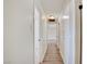 Hallway with modern wood flooring, neutral paint, and recessed lighting at 304 Elliott Ave, Las Vegas, NV 89106