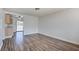 Inviting living space with new floors leading to the kitchen area and backyard access at 304 Elliott Ave, Las Vegas, NV 89106